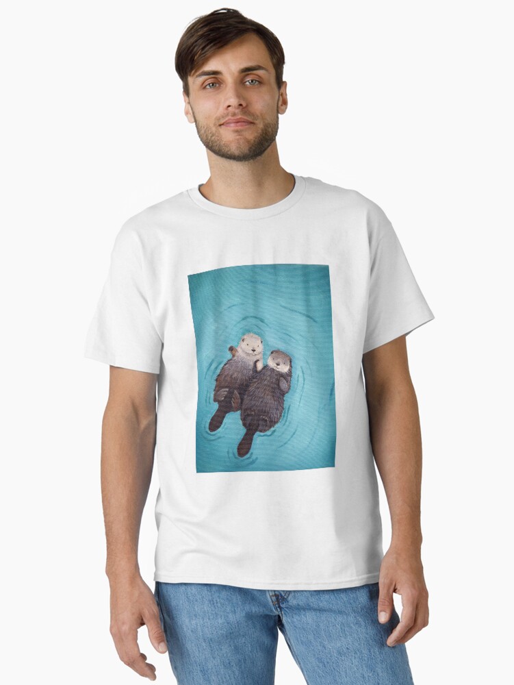 Thumbnail 1 von 7, Classic T-Shirt, Otterly Romantic - Die offiziellen Otter, die Hände halten designt und verkauft von wguineapigsfly.