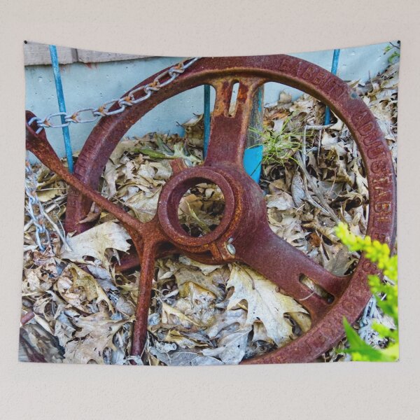 Item preview, rusty wheel in the garden designed and sold by Lisa Casineau.