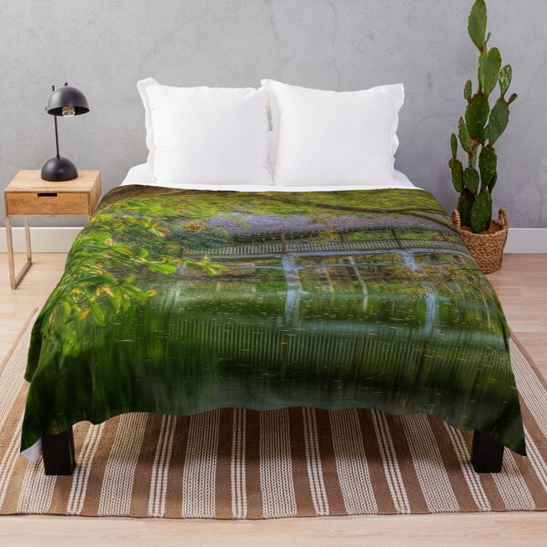 Item preview, Tropical Bridge reflecting in emerald green water designed and sold by Steven Kight.