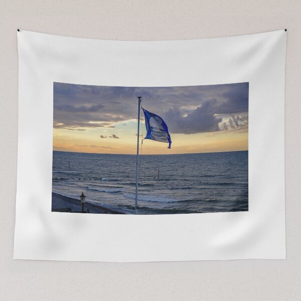 Item preview, Flag flying in the breeze over Sheringham beach on the Norfolk coast designed and sold by yackers1.