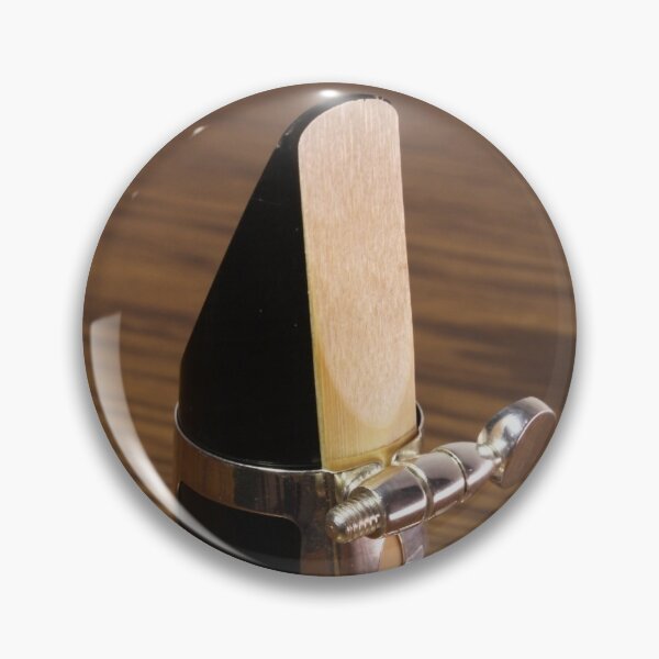 Item preview, Mouthpiece of clarinet wind musical instrument on wood background designed and sold by Grégory DUBUS.