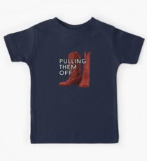 Pulling. Them. Off. The Red Boots. Kids Tee