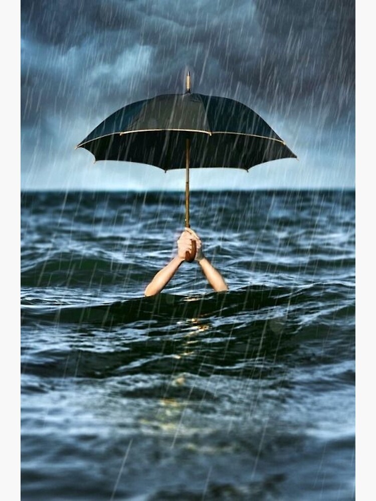 Rain holding black umbrella in ocean underwater