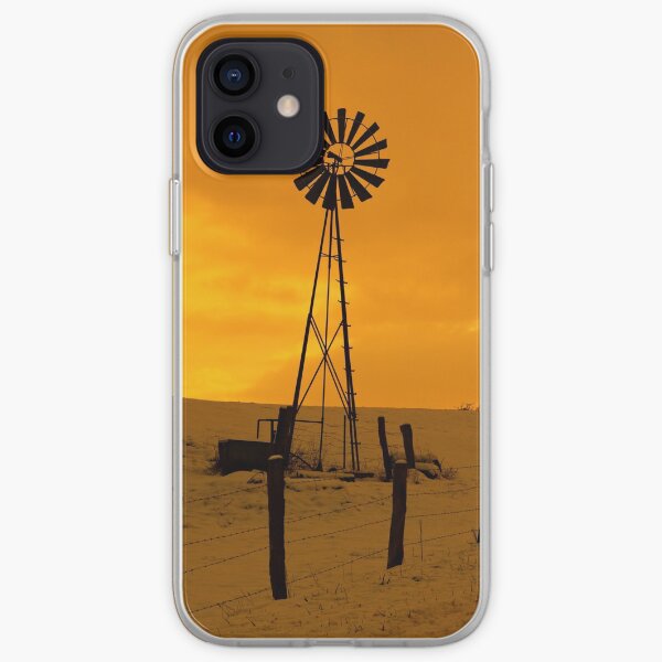 éolienne, paysage neigeux et coucher du soleil Coque souple iPhone