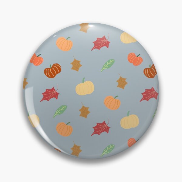 Aperçu de l'œuvre Citrouilles et feuilles sur gris créée et vendue par RepeatCandy.