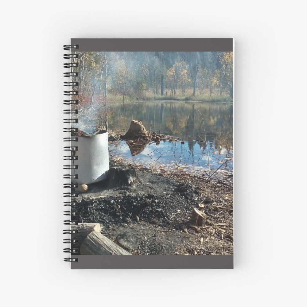 Autumnal drum fire by the lake horizontal Spiral Notebook