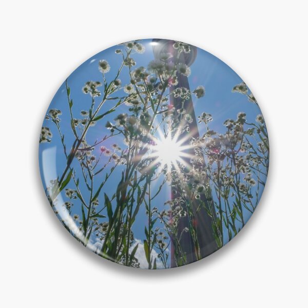 Item preview, Toronto CN Tower: unusual angle with tall grass and sunflare designed and sold by VadimK.