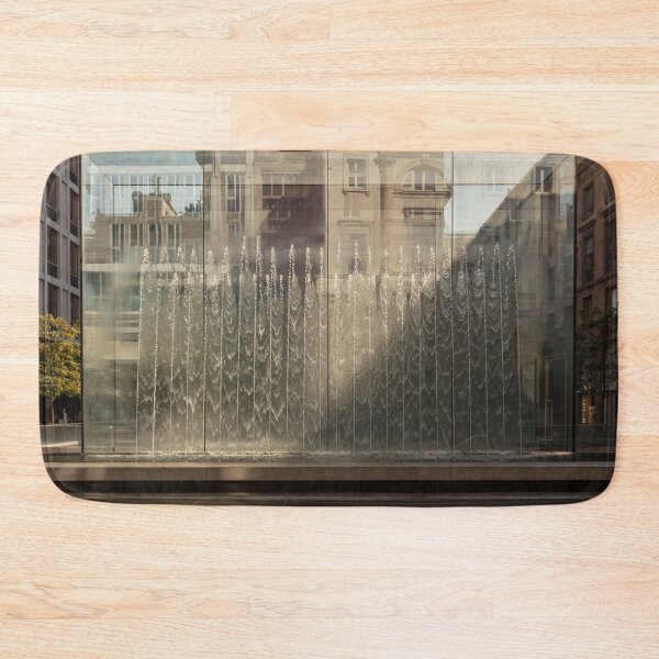 Item preview, Modern fountain with water splashes on a huge glass window cut by the shadow designed and sold by brambillasimone.