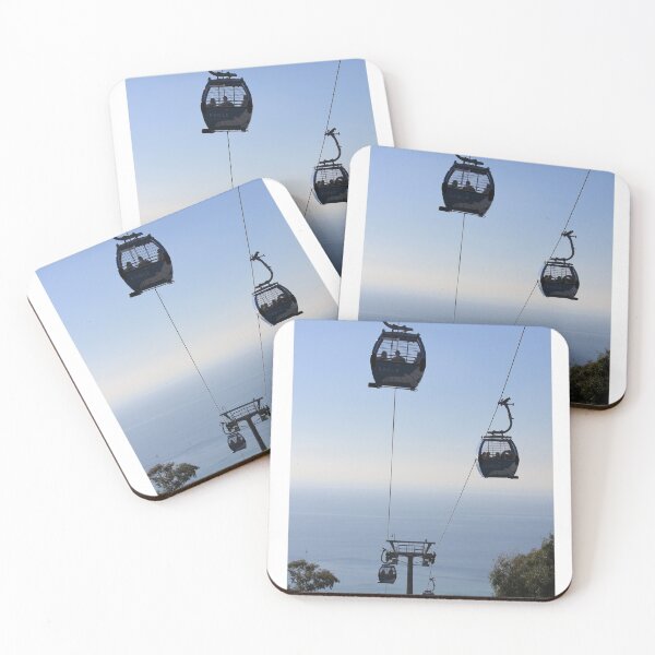 Item preview, Chair lift taking tourists towards ocean  designed and sold by Joelstewart.
