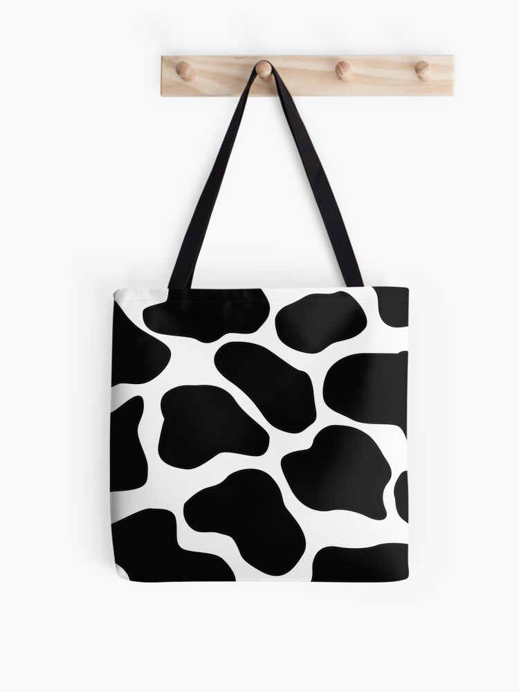 Sac fourre-tout for Sale avec l'œuvre « motif imprimé vache noir