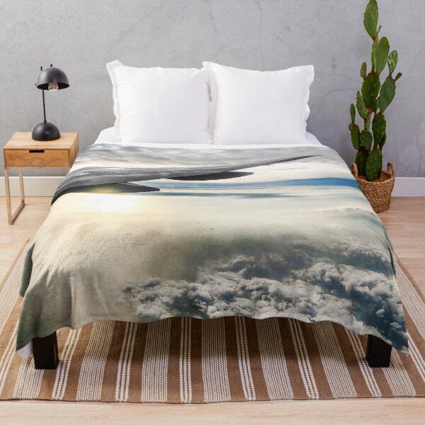 Item preview, Travel photograph sunrise from an airplane over clouds and sea designed and sold by Vela Barrera.