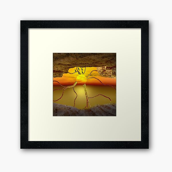 Sunset view from a cave with beaded sunrays Framed Art Print