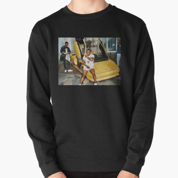Mike Tyson sitting on his Lambo Pullover Sweatshirt