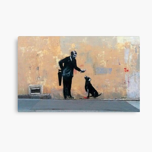 Banksy Man With Saw Feeding Dog Its own Leg Bone - Paris 2018 World Refugee Day Canvas Print