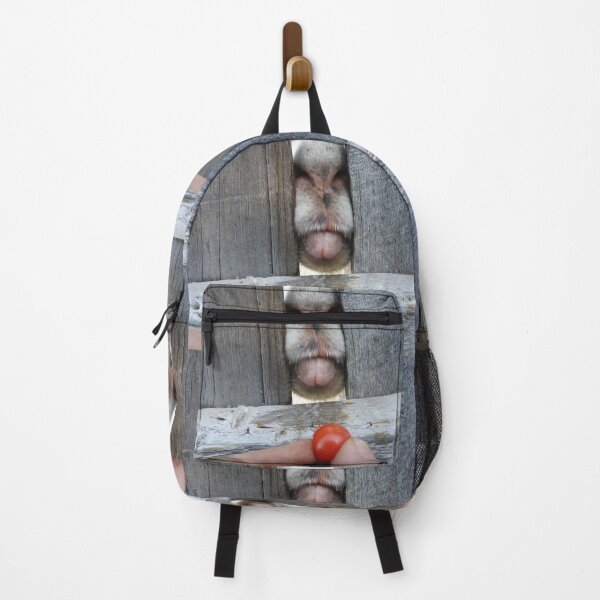 Item preview, funny goat face, goat tongue eating a tomato designed and sold by Stephanie Skeem.