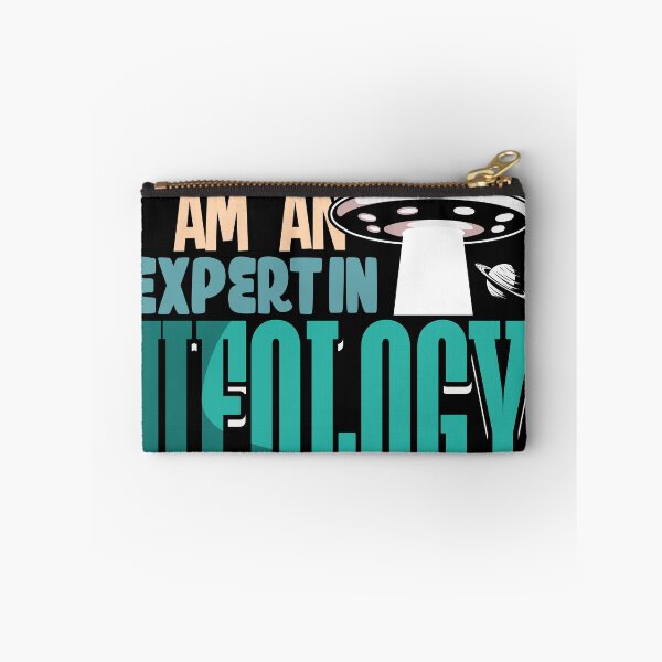 Item preview, I Am an Expert in Ufology  alien shirt design designed and sold by Grinover.