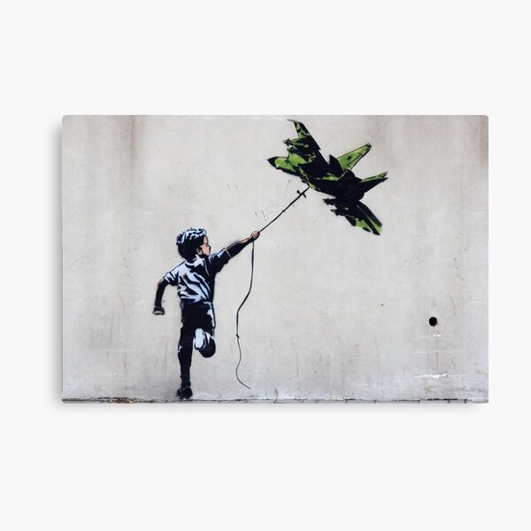 BANKSY Boy Playing With Jetfighter Kite - Street Art Ukraine Canvas Print