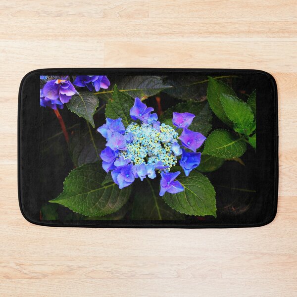 Item preview, Close-up of a hydrangea with blue buds and flowers as well as green foliage designed and sold by Kristina Drozd.