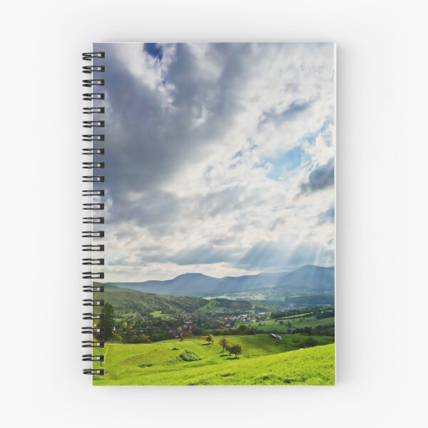 Item preview, Sun shining through the clouds over beautiful green valley designed and sold by Alexander Sorokopud.