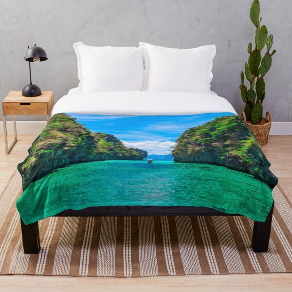 Item preview, Tropical landscape with rock islands, lonely boat and crystal clear water designed and sold by pure-pixels.