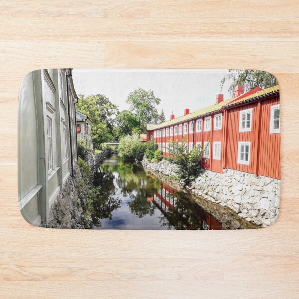 Item preview, Old wooden houses by the river in Sweden Reflection in water designed and sold by Tanja Dianova.