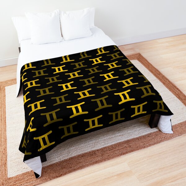 Golden yellow gemini sign, astrology zodiac symbol black background Comforter