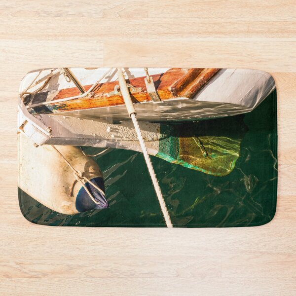 Item preview, Boats rudder reflection harbour clear water designed and sold by DavidMay.