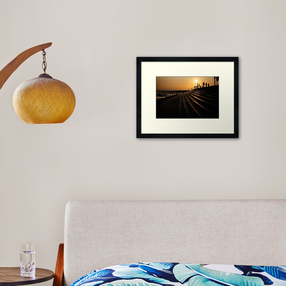 Walking during Sunset Framed Art Print