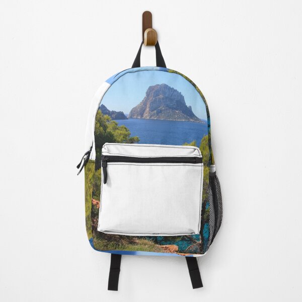Item preview, The solitary islet of Es Vedra in contrast against the blue sea of ​​Ibiza immersed in the green and arid wild nature in Spain designed and sold by alessiapenny.