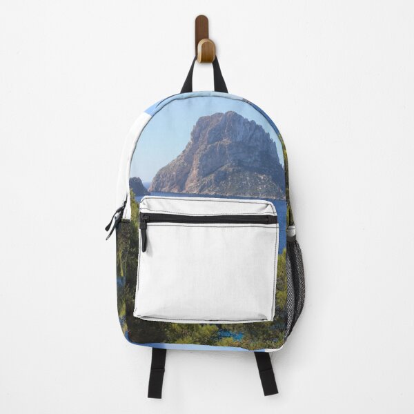 Item preview, The solitary islet of Es Vedra in contrast against the blue sea of ​​Ibiza immersed in the green and arid wild nature in Spain designed and sold by alessiapenny.