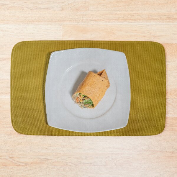 Item preview, Vegetarian wrap served on a white plate resting on a mustard-colored table runner designed and sold by brambillasimone.