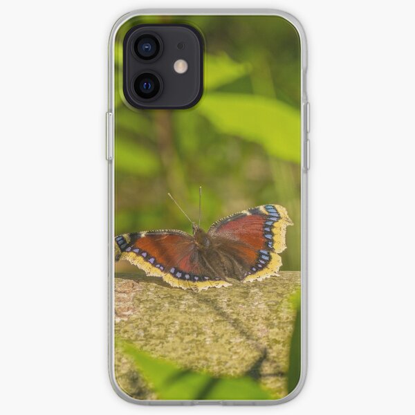 Butterfly in the forest: enchanting Mourning cloak iPhone Soft Case