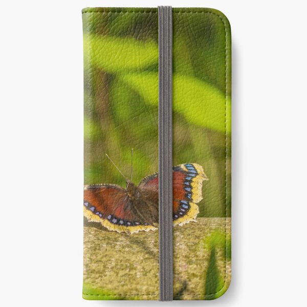 Butterfly in the forest: enchanting Mourning cloak iPhone Wallet