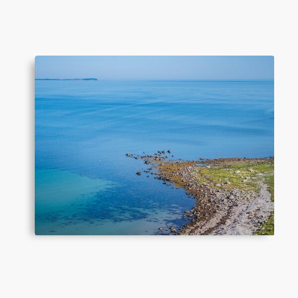 Coastlines frame the blue sea Canvas Print