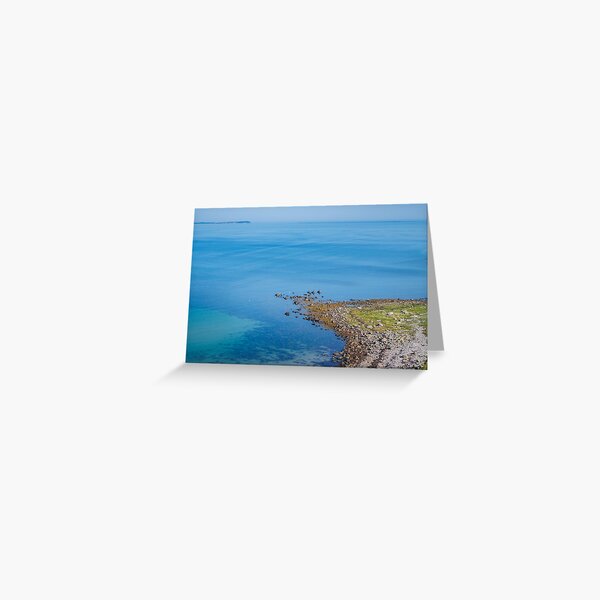 Coastlines frame the blue sea Greeting Card