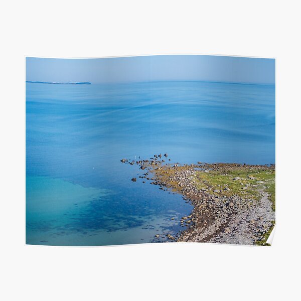 Coastlines frame the blue sea Poster