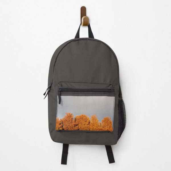 Item preview, Golden burnt orange trees under a stormy sky designed and sold by Emma Amies.