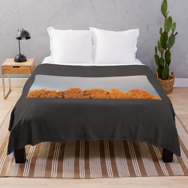 Item preview, Golden burnt orange trees under a stormy sky designed and sold by Emma  Amies.