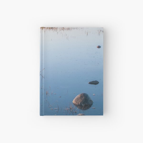 Shallow waters and no wind on a quiet day Hardcover Journal