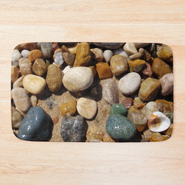 Item preview, Wet sea stones and pebbles on beach sand designed and sold by NinelRo.