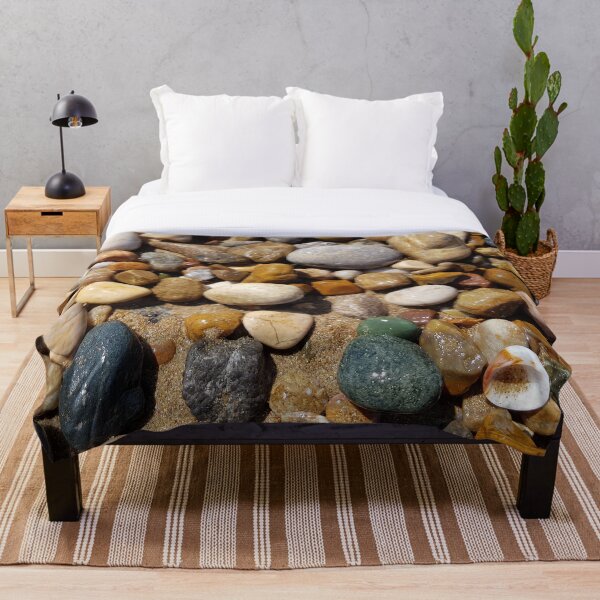 Item preview, Wet sea stones and pebbles on beach sand designed and sold by NinelRo.