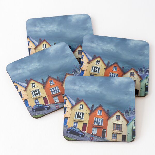 Item preview, Colorful Rowhouses in Cobh, Ireland with Cathedral Looming in Background designed and sold by Greg Hess.