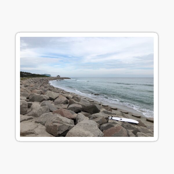 Surfboard On The Rocks Sticker