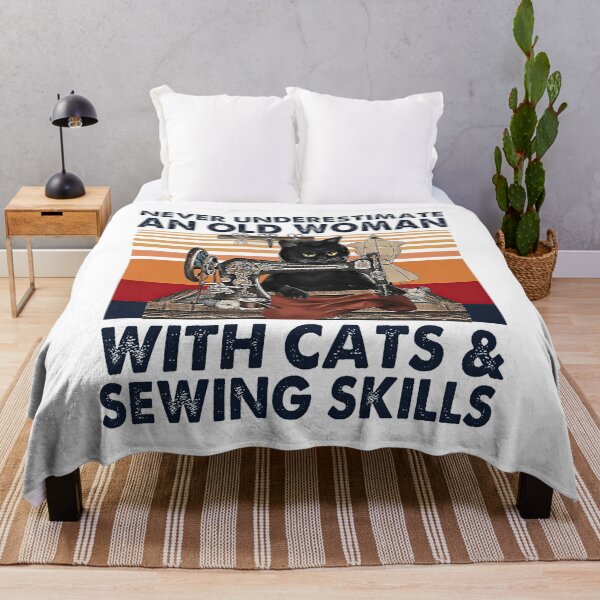 Item preview, Never underestimate an old woman with cats and sewing skills designed and sold by KathysRyan.