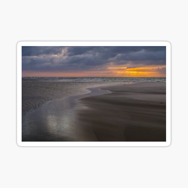 Sunrise over the ocean at the northern tip of Denmark Sticker
