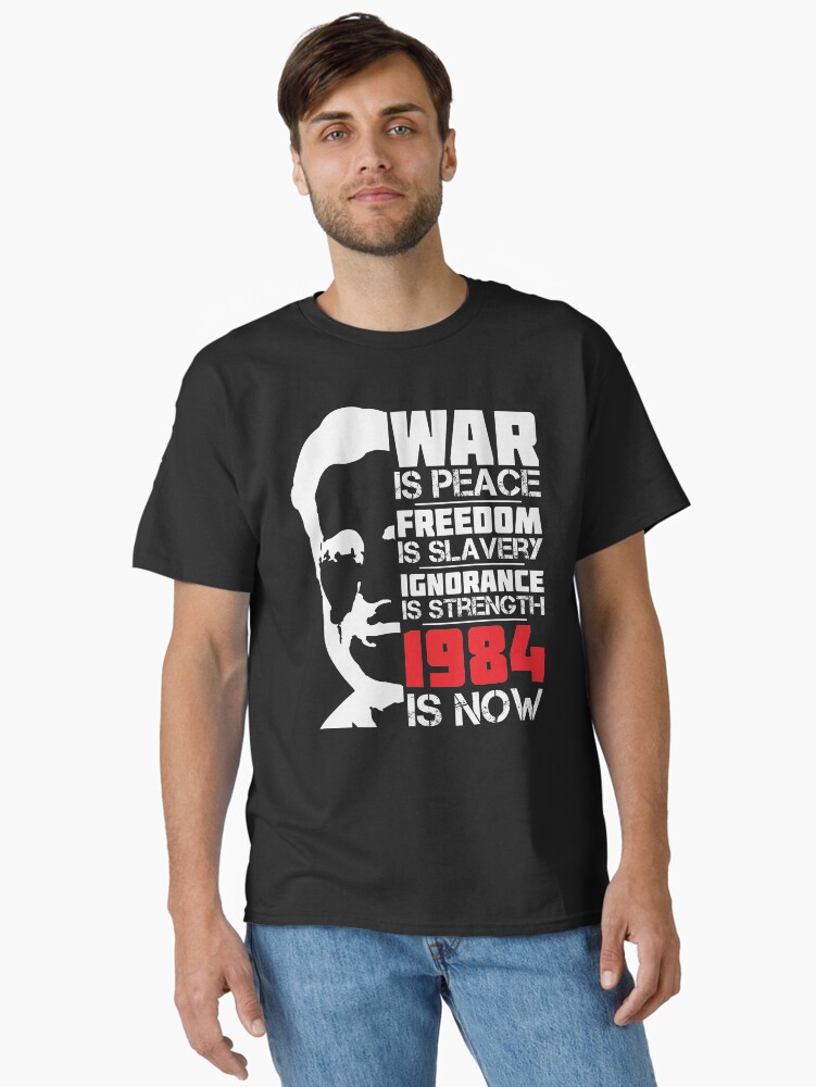 Imagen 2 de 7, Camiseta clásica con la obra La guerra es paz, la libertad es esclavitud, la ignorancia es fuerza, 1984 es ahora, diseñada y vendida por CatsCrew.