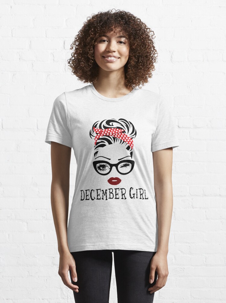 Disover December girl woman face wink eyes lady Essential T-Shirt