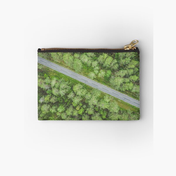 Item preview, Empty road going diagonally through the forest top down aerial view designed and sold by Lukasz Szczepanski.