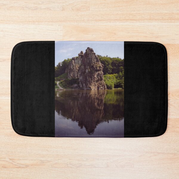 Item preview, Externsteine with a reflection in the lake at Teutoburg forest in bright colors designed and sold by sword-snobby.