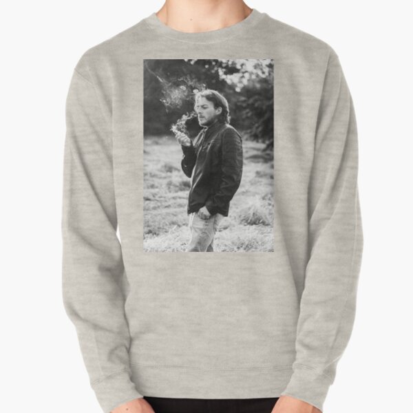 Male model smoking in nature #1 Pullover Sweatshirt